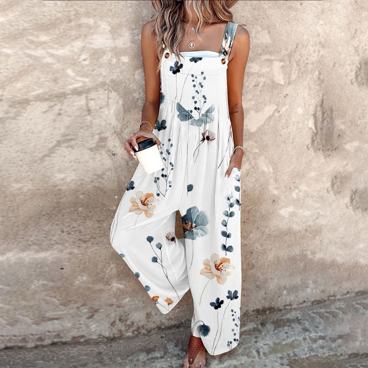 Indira - Mouwloze jumpsuit met prachtige print