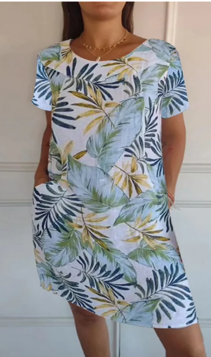 Kaevyn - Vrouwelijke vloeiende jurk met tuinprint