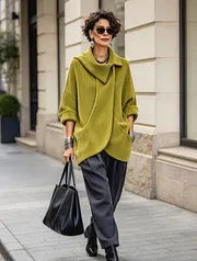 Théoline - Oversized damesvest van ribgebreide stof met asymmetrische kraag