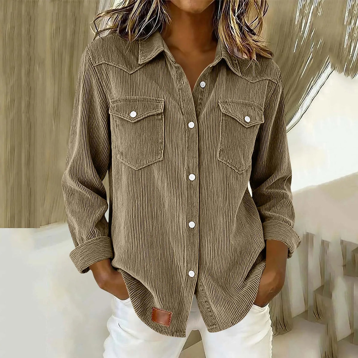 Sigrid - Gestreepte damesblouse met knopen en zakken