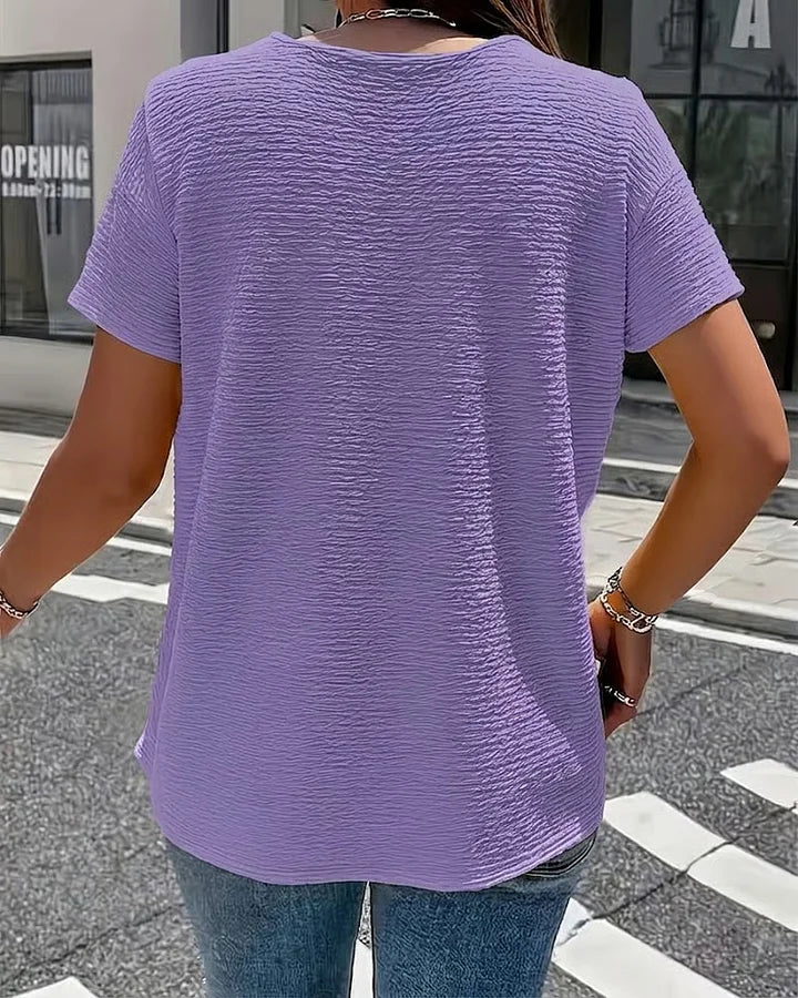 Syzelle - Dames t-shirt met ronde hals textuur korte mouwen elegante decoratieve knopen
