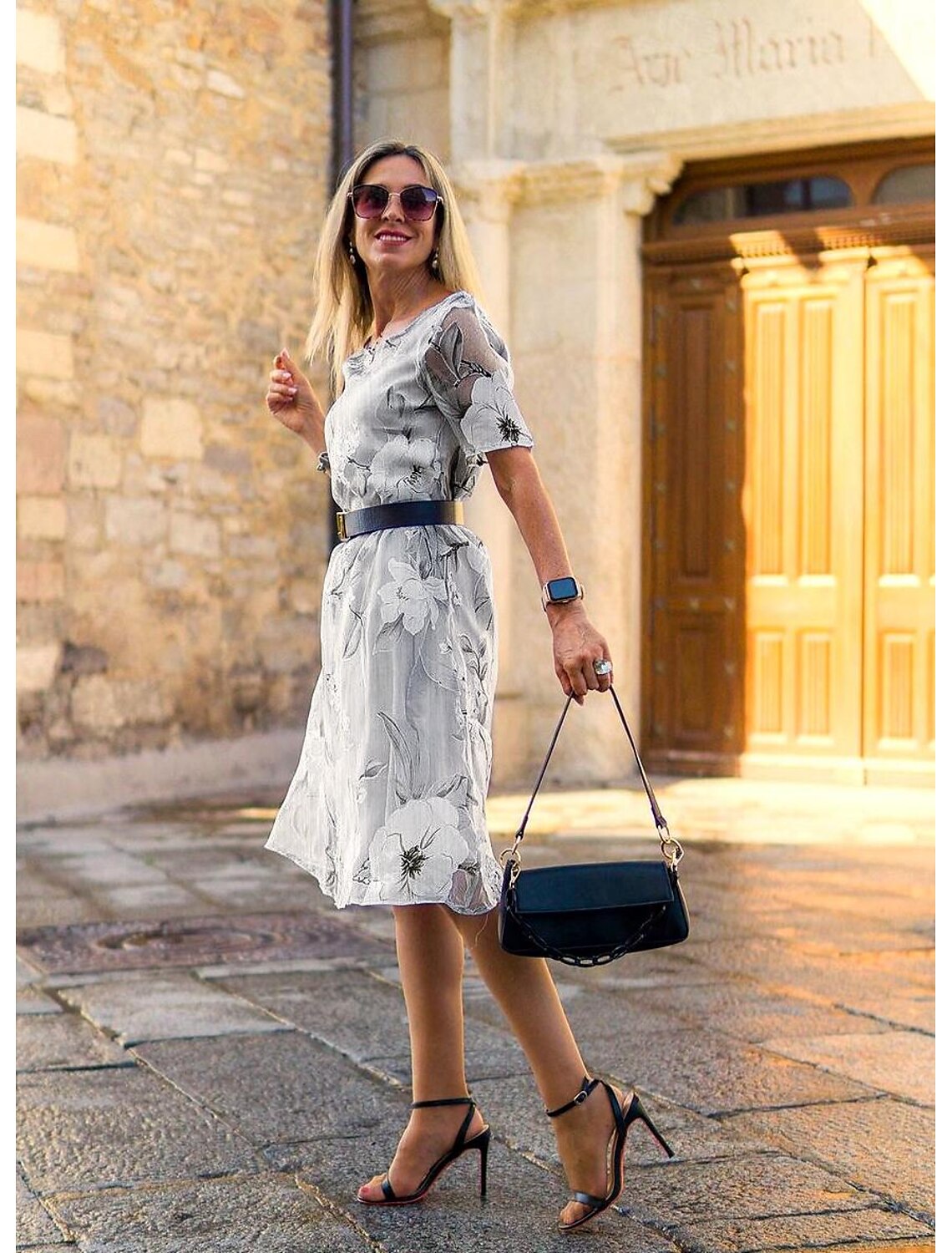Serenella - geplooide midi-jurk met bloemenprint