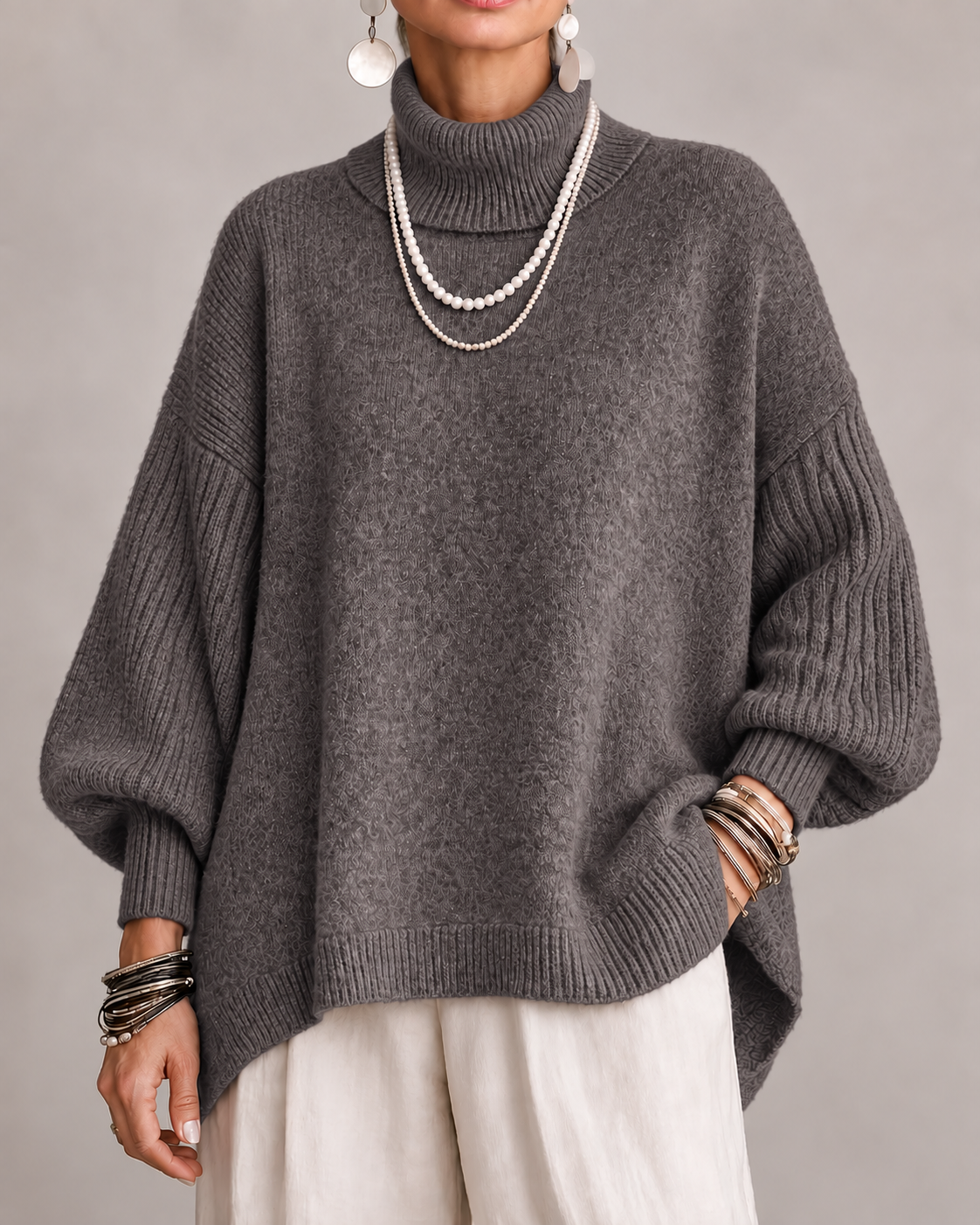 Olympe - Oversized col roulé dames met geribbelde mouwen