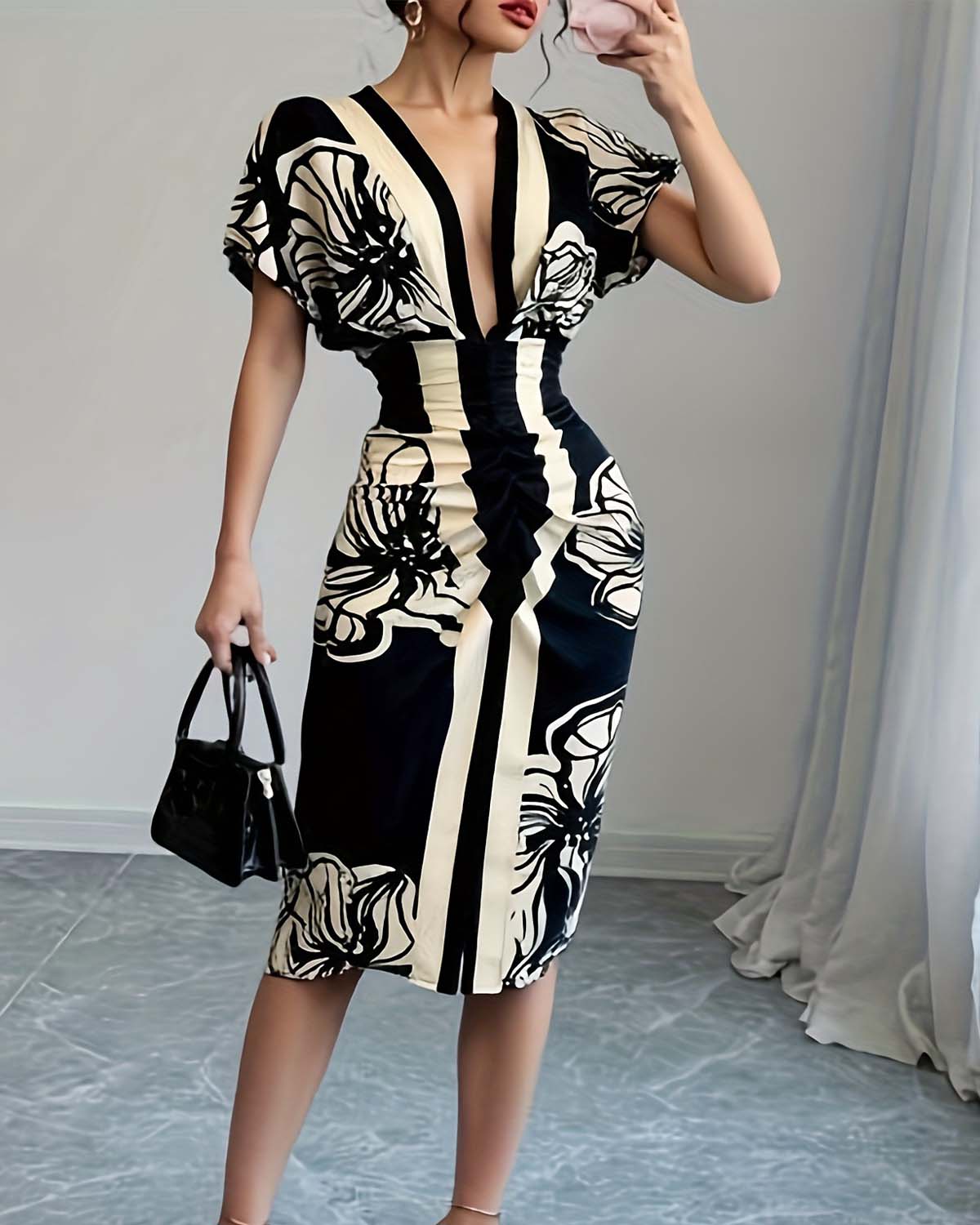 Jorelia - Chic geplooide jurk - Verfijning en tijdloze elegantie