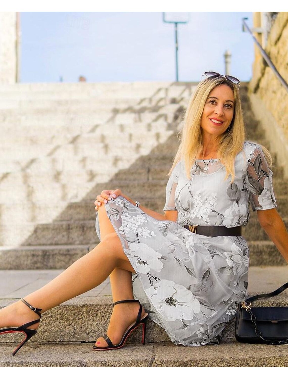 Serenella - geplooide midi-jurk met bloemenprint