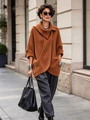 Théoline - Oversized damesvest van ribgebreide stof met asymmetrische kraag