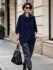 Théoline - Oversized damesvest van ribgebreide stof met asymmetrische kraag