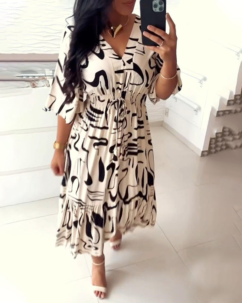 Sanae - Jurk met V-hals en elegante print