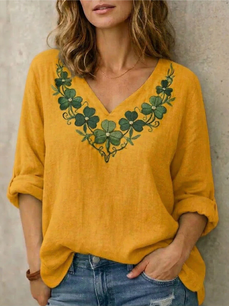 Jynelle - Elegante Blouse met V-hals en Borduursel