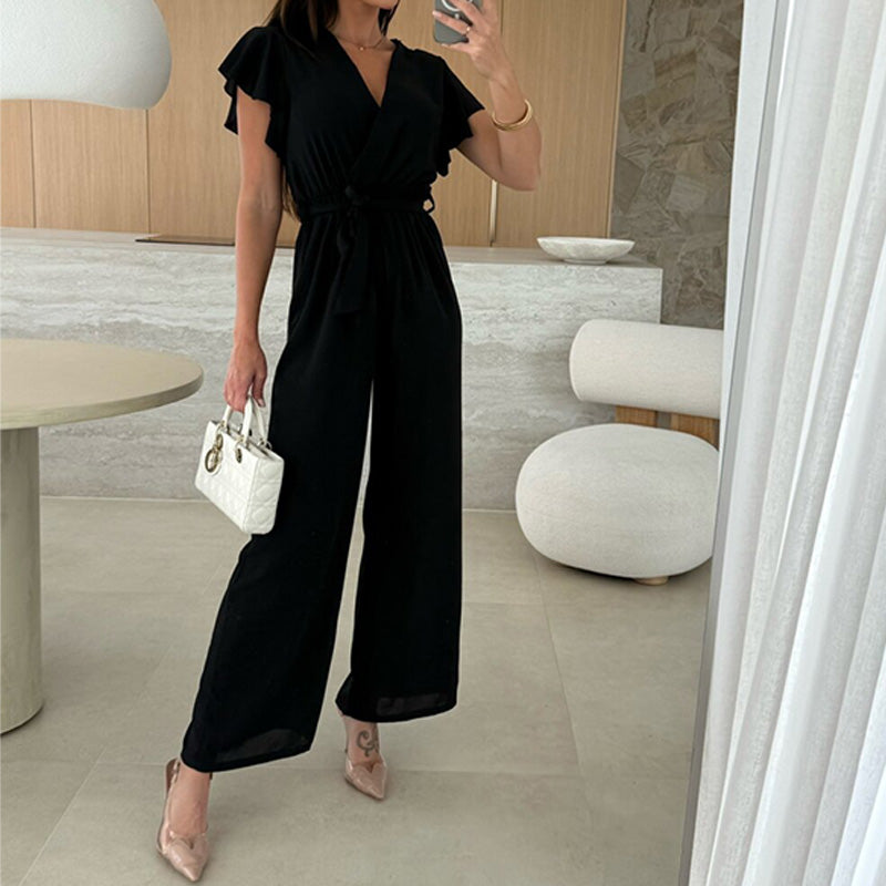 Isolina - Effen jumpsuit met V-hals, mouwen met ruches en wijde pijpen