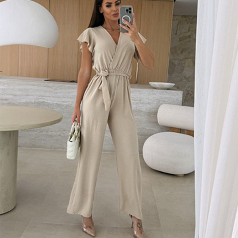 Isolina - Effen jumpsuit met V-hals, mouwen met ruches en wijde pijpen