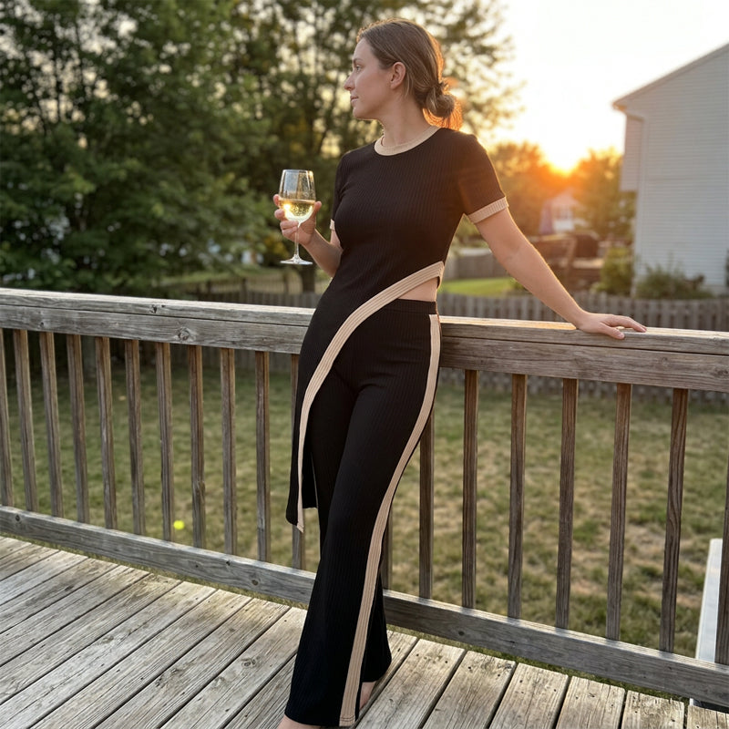Torina - Asymmetrische damesoutfit met contrasterende flared broek