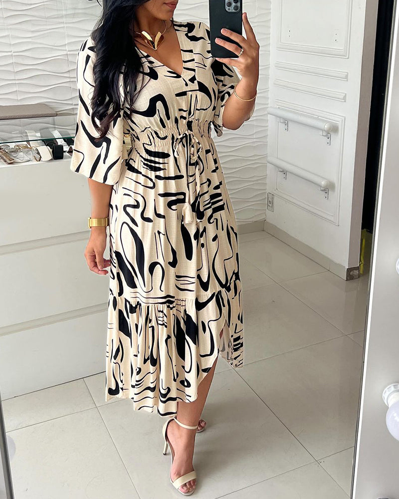 Sanae - Jurk met V-hals en elegante print