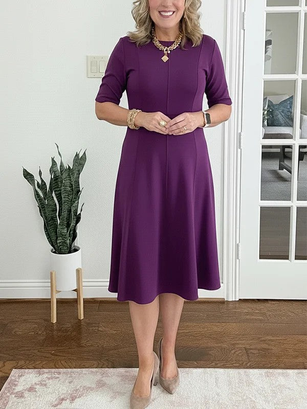 Quirinae - Elegante Midi Jurk met Uitlopende Snit en Mouwen