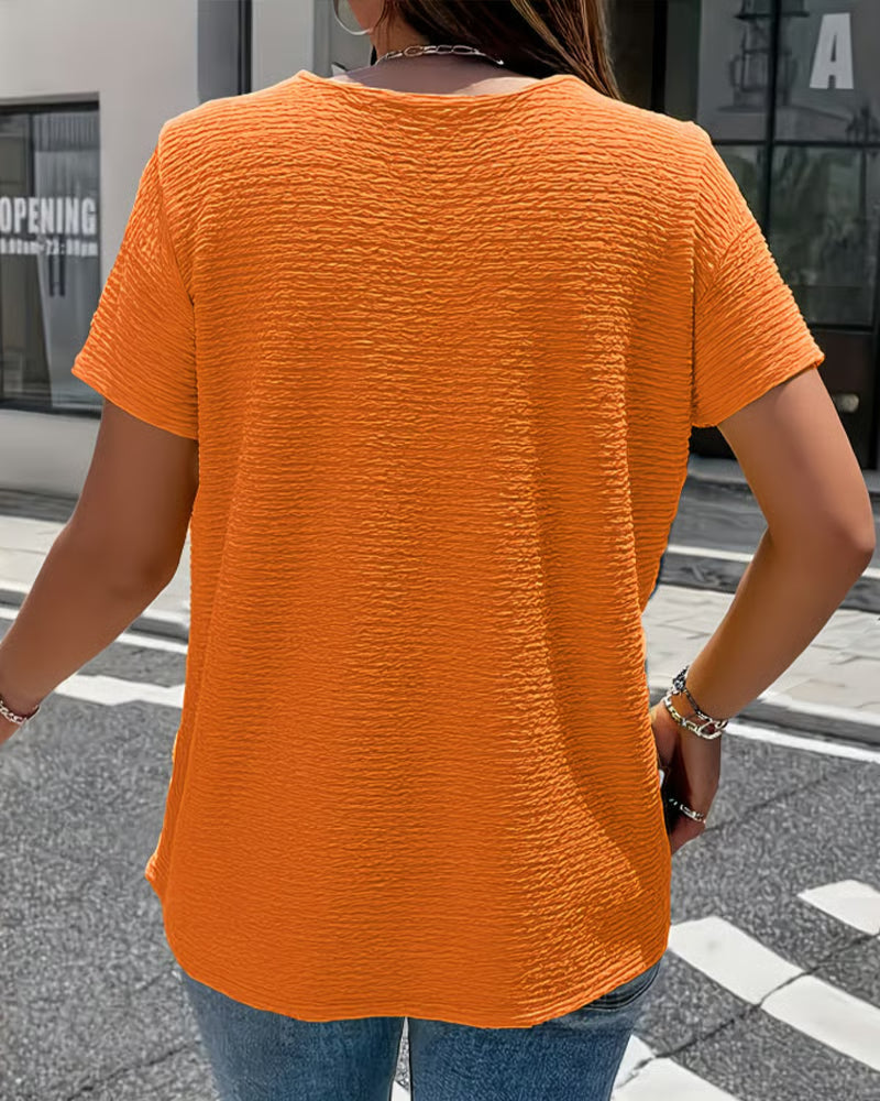 Syzelle - Dames t-shirt met ronde hals textuur korte mouwen elegante decoratieve knopen