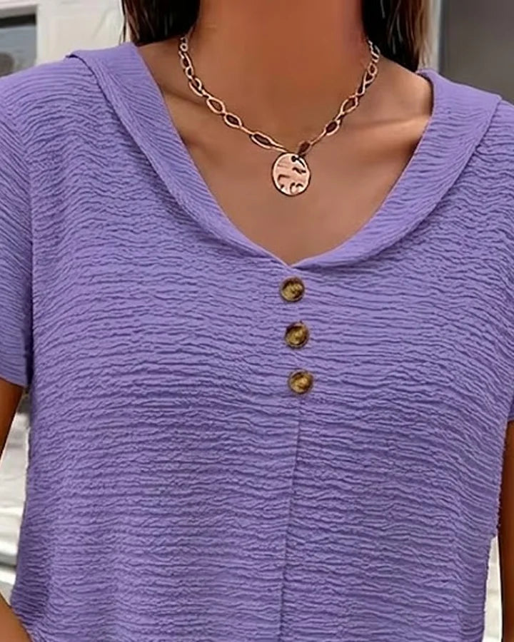 Syzelle - Dames t-shirt met ronde hals textuur korte mouwen elegante decoratieve knopen