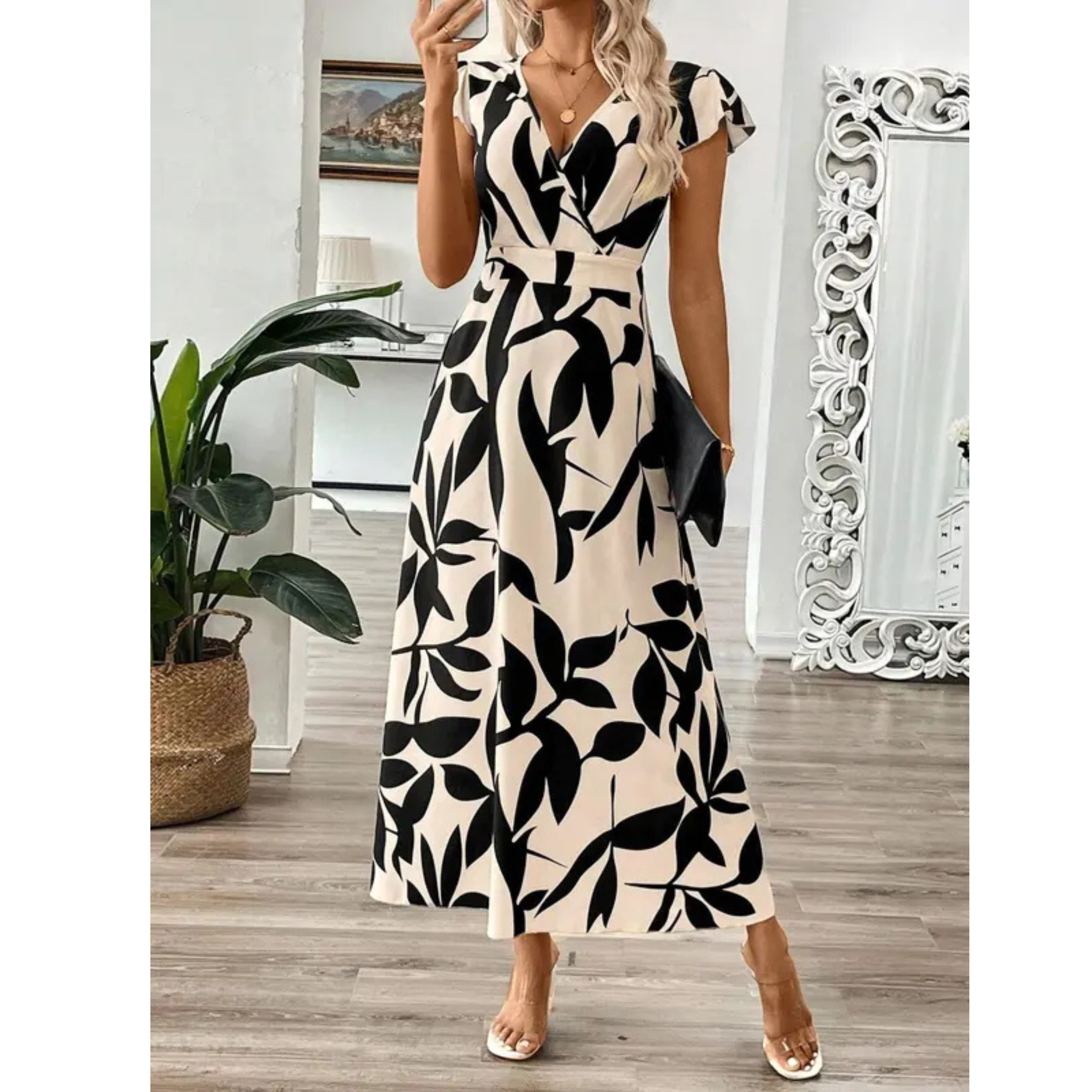 Korevyn - Elegante vloeiende maxi jurk voor dames met zwart en beige bloemenprint