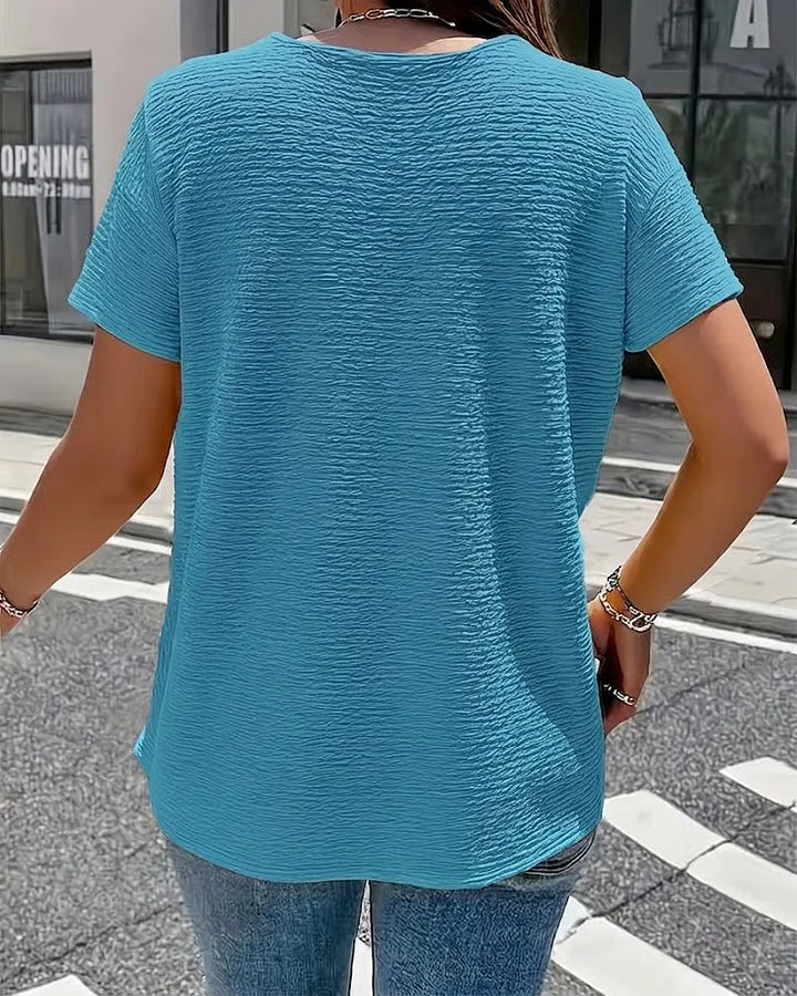 Syzelle - Dames t-shirt met ronde hals textuur korte mouwen elegante decoratieve knopen