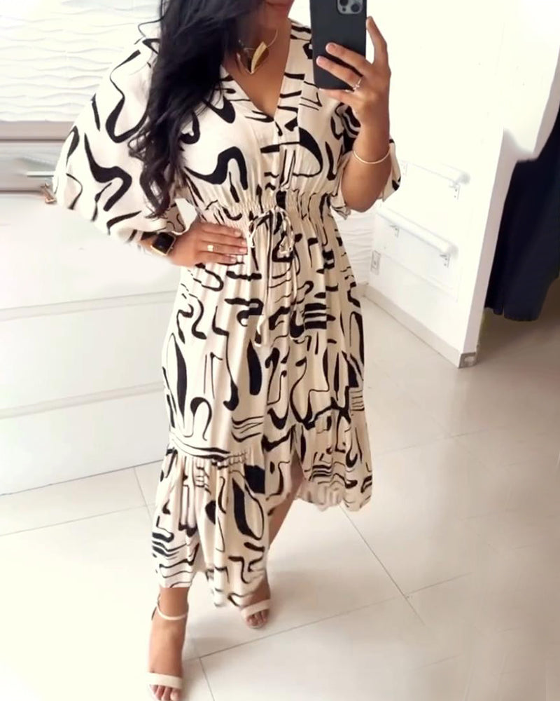 Sanae - Jurk met V-hals en elegante print