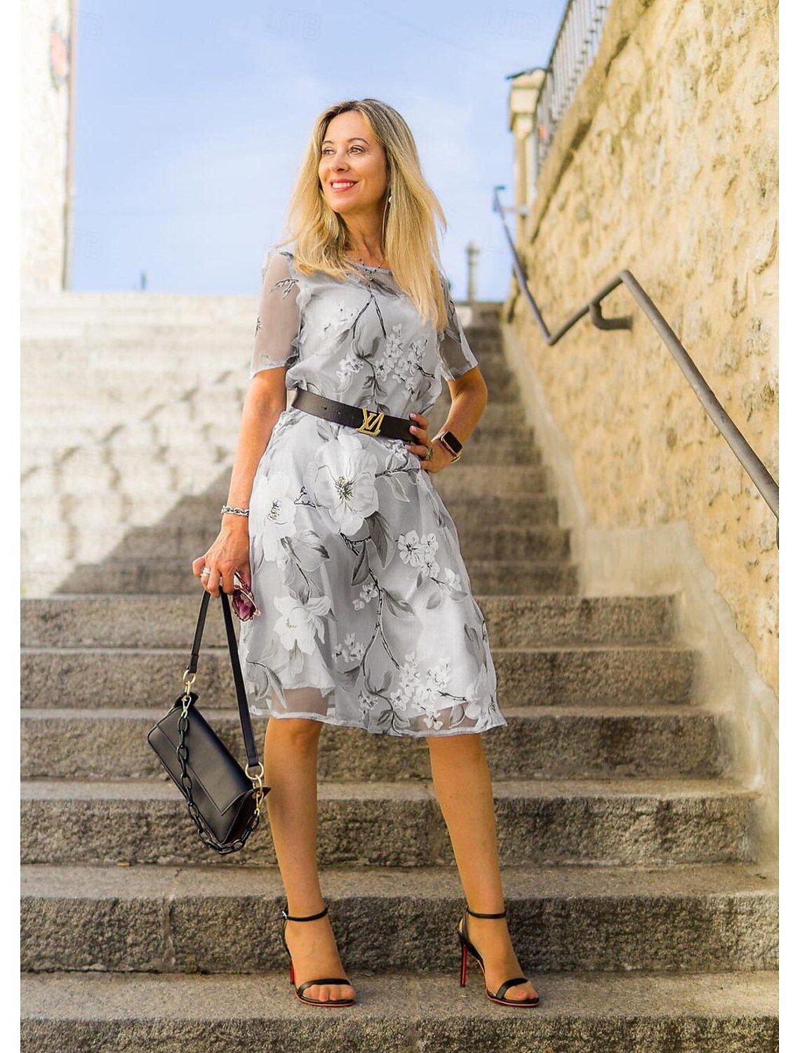 Serenella - geplooide midi-jurk met bloemenprint