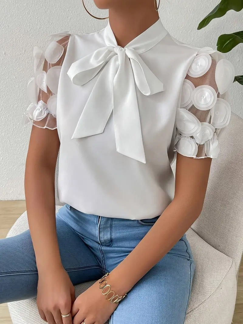 Cirelle - Effen kanten zomerblouse met strik en korte mouwen