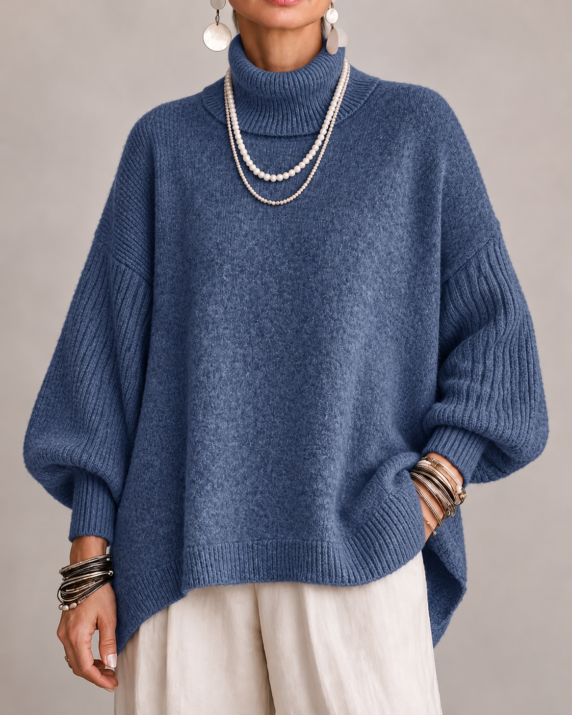 Olympe - Oversized col roulé dames met geribbelde mouwen