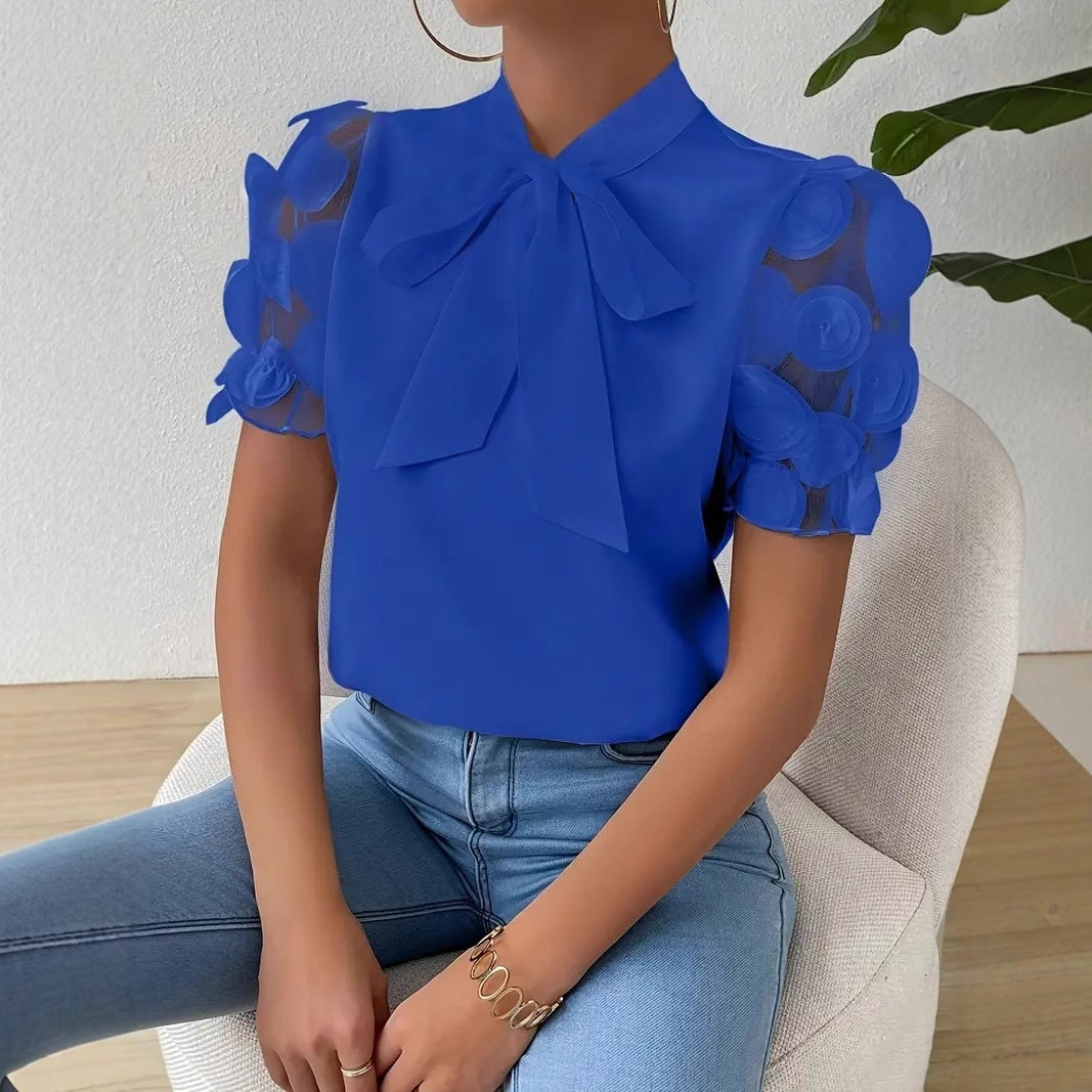 Cirelle - Effen kanten zomerblouse met strik en korte mouwen