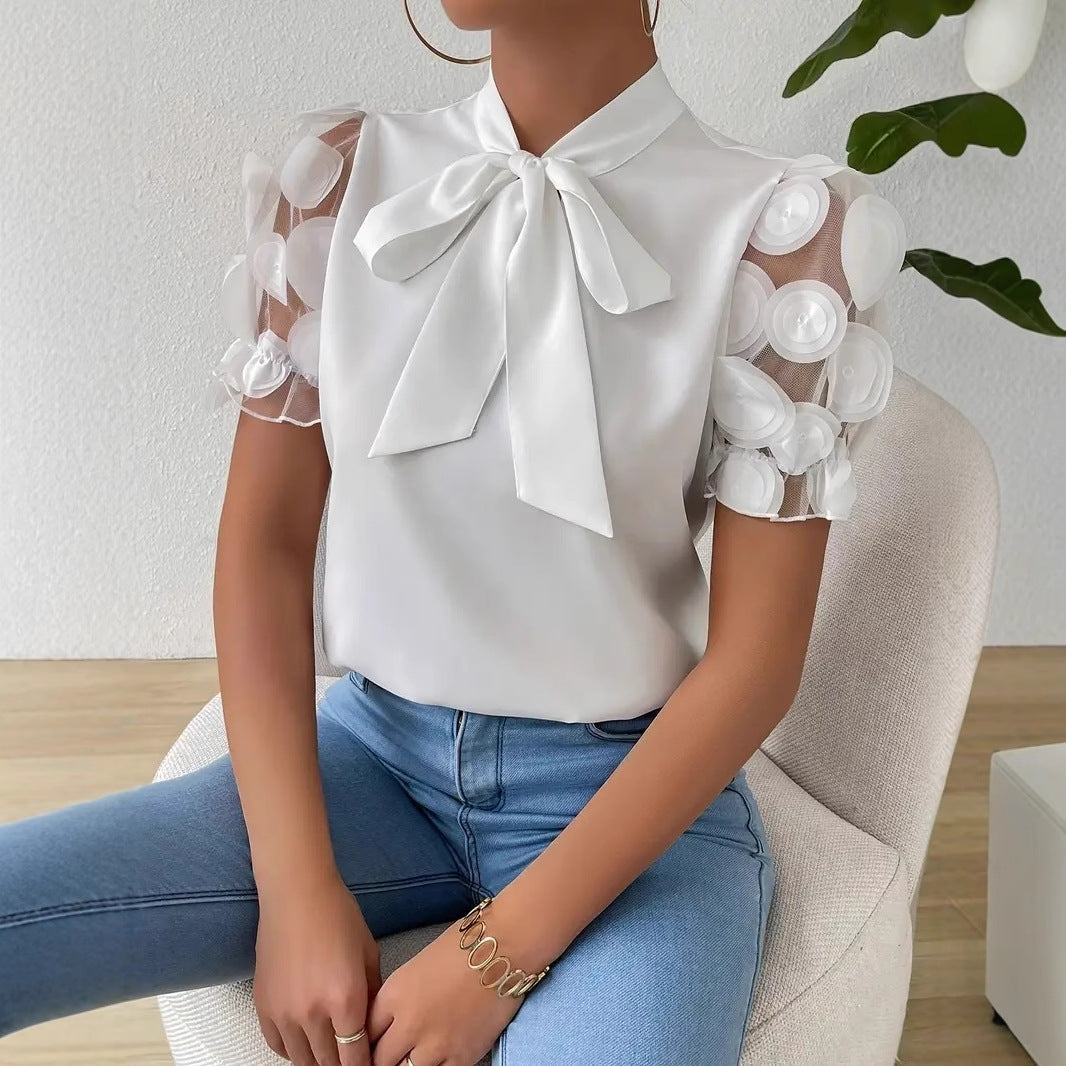 Cirelle - Effen kanten zomerblouse met strik en korte mouwen