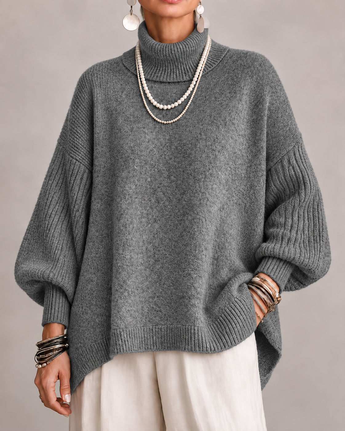 Olympe - Oversized col roulé dames met geribbelde mouwen