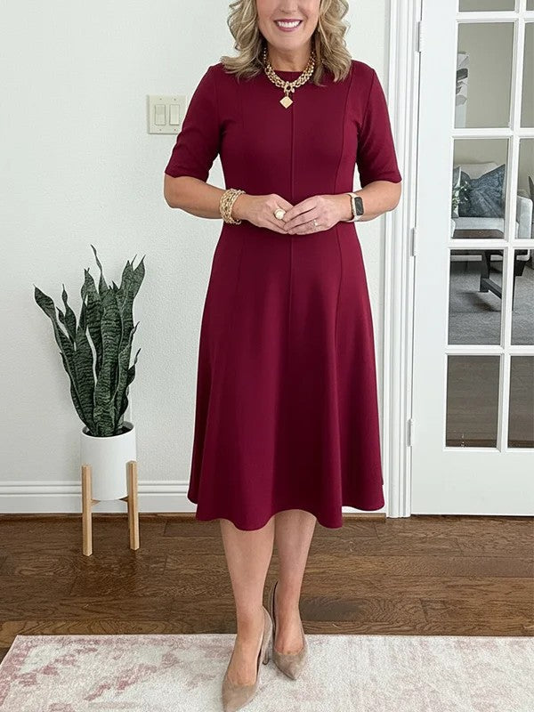 Quirinae - Elegante Midi Jurk met Uitlopende Snit en Mouwen