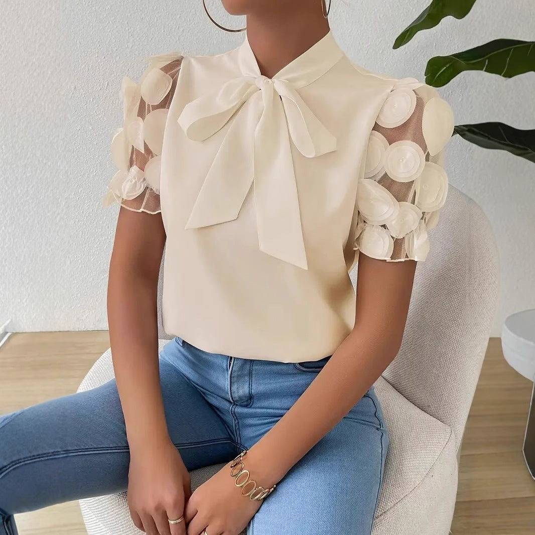 Cirelle - Effen kanten zomerblouse met strik en korte mouwen