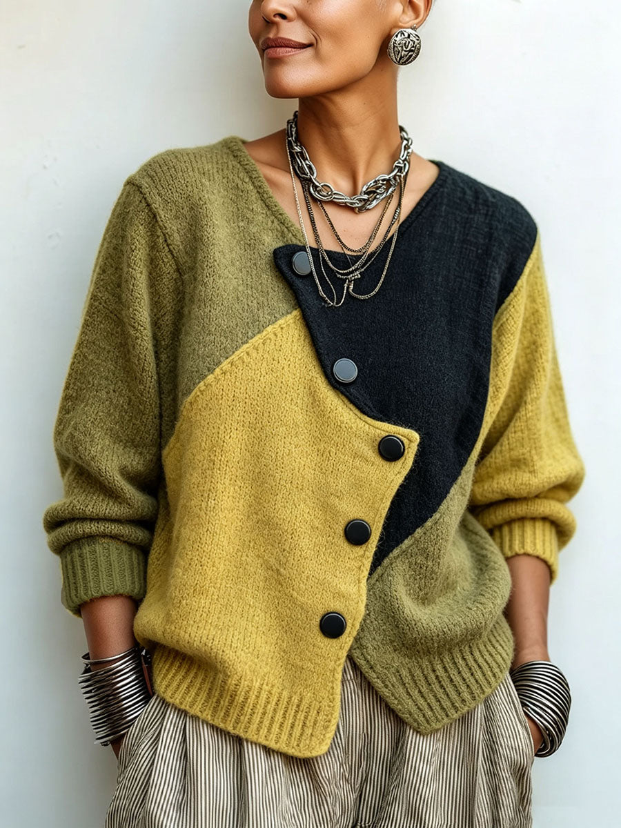 Josine - Dames trui met kleurblok in gebreid materiaal en asymmetrische knopen
