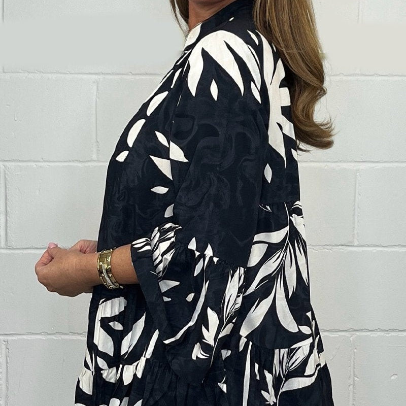 Alix - Elegante blouse met uitlopende mouwen en V-hals
