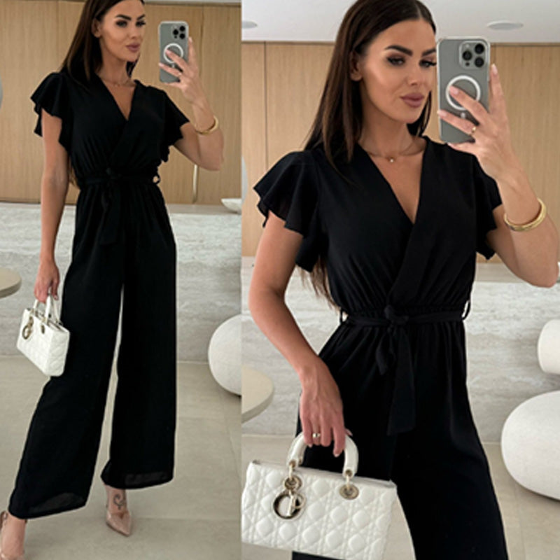 Isolina - Effen jumpsuit met V-hals, mouwen met ruches en wijde pijpen