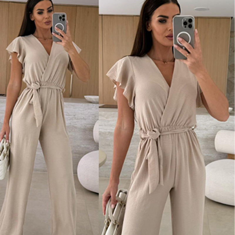 Isolina - Effen jumpsuit met V-hals, mouwen met ruches en wijde pijpen
