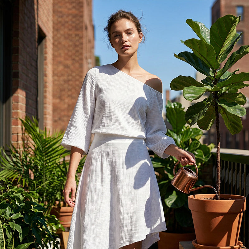 Nisella - Damesensemble met off-shoulder top en asymmetrische rok
